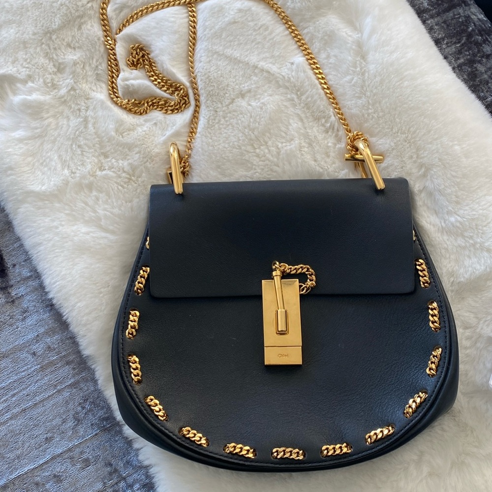 Like new med. size leather Chloe bag with gold chain detail. Authenticity card.
